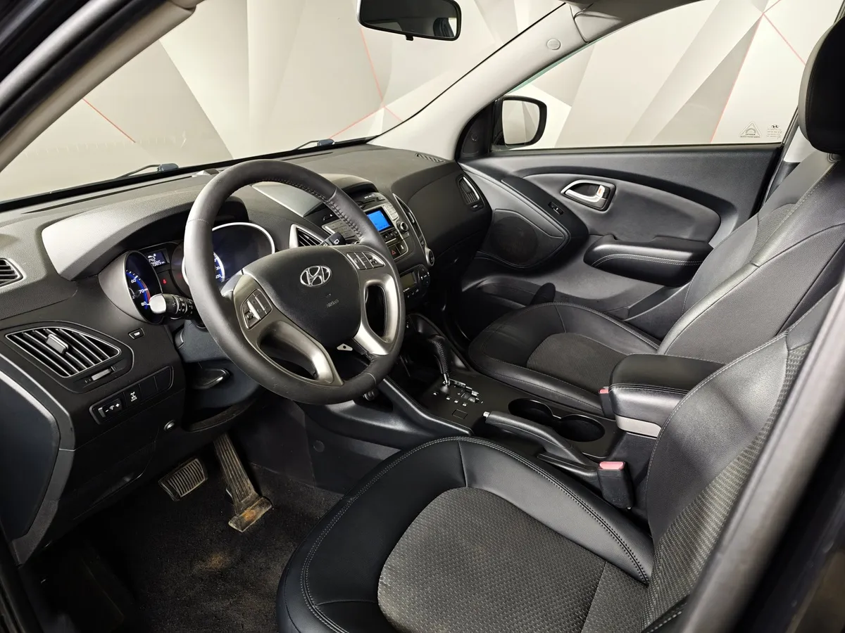 Hyundai ix35 2.0 AT 4WD (150 л.с.) Comfort Черный в АВИЛОН. Слайд №19
