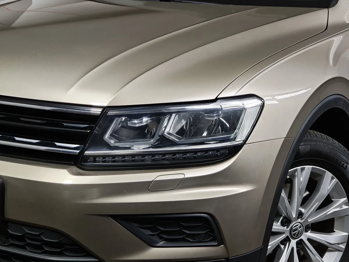 Volkswagen Tiguan 1.4 TSI 4Motion DSG (150 л.с.) OFFROAD Коричневый в АВИЛОН. Слайд №9