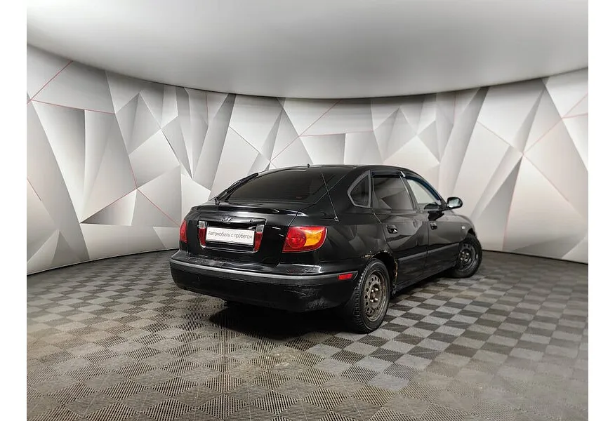 Hyundai Elantra 1.6 AT (105 л.с.) Черный в АВИЛОН. Слайд №2