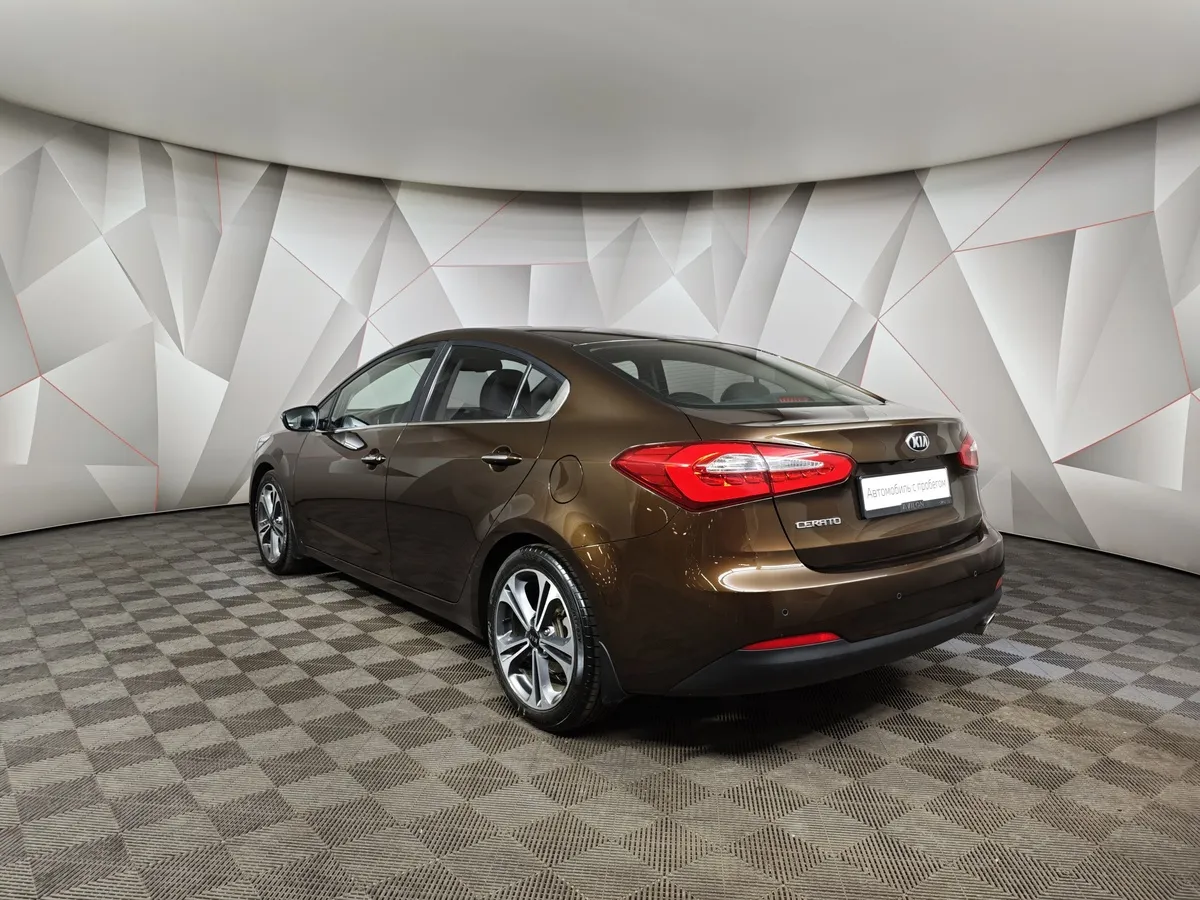 Kia Cerato 1.6 AT (130 л.с.) Коричневый в АВИЛОН. Слайд №4
