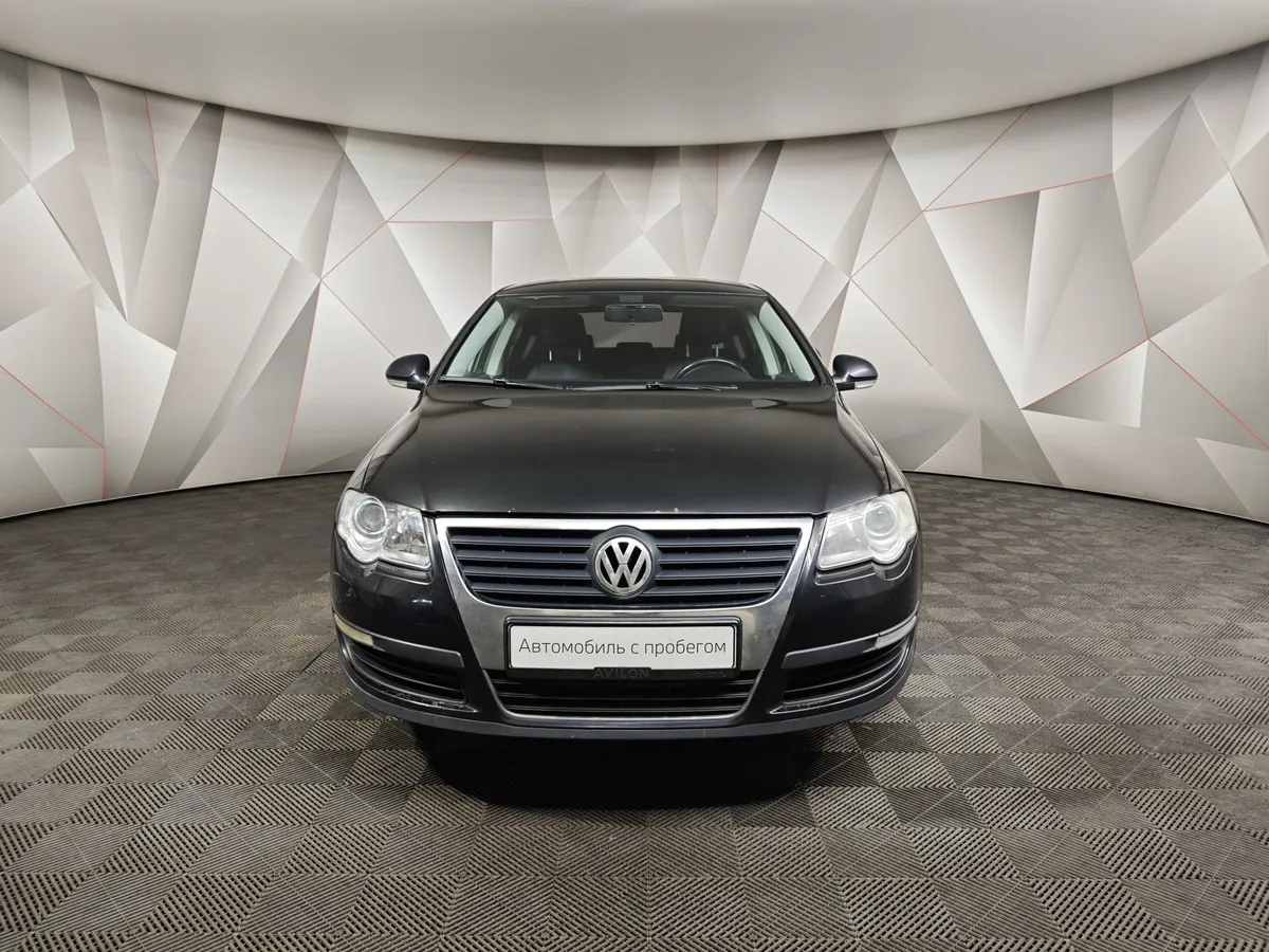 Volkswagen Passat 1.6 MPI MT (102 л.с.) Черный в АВИЛОН. Слайд №7