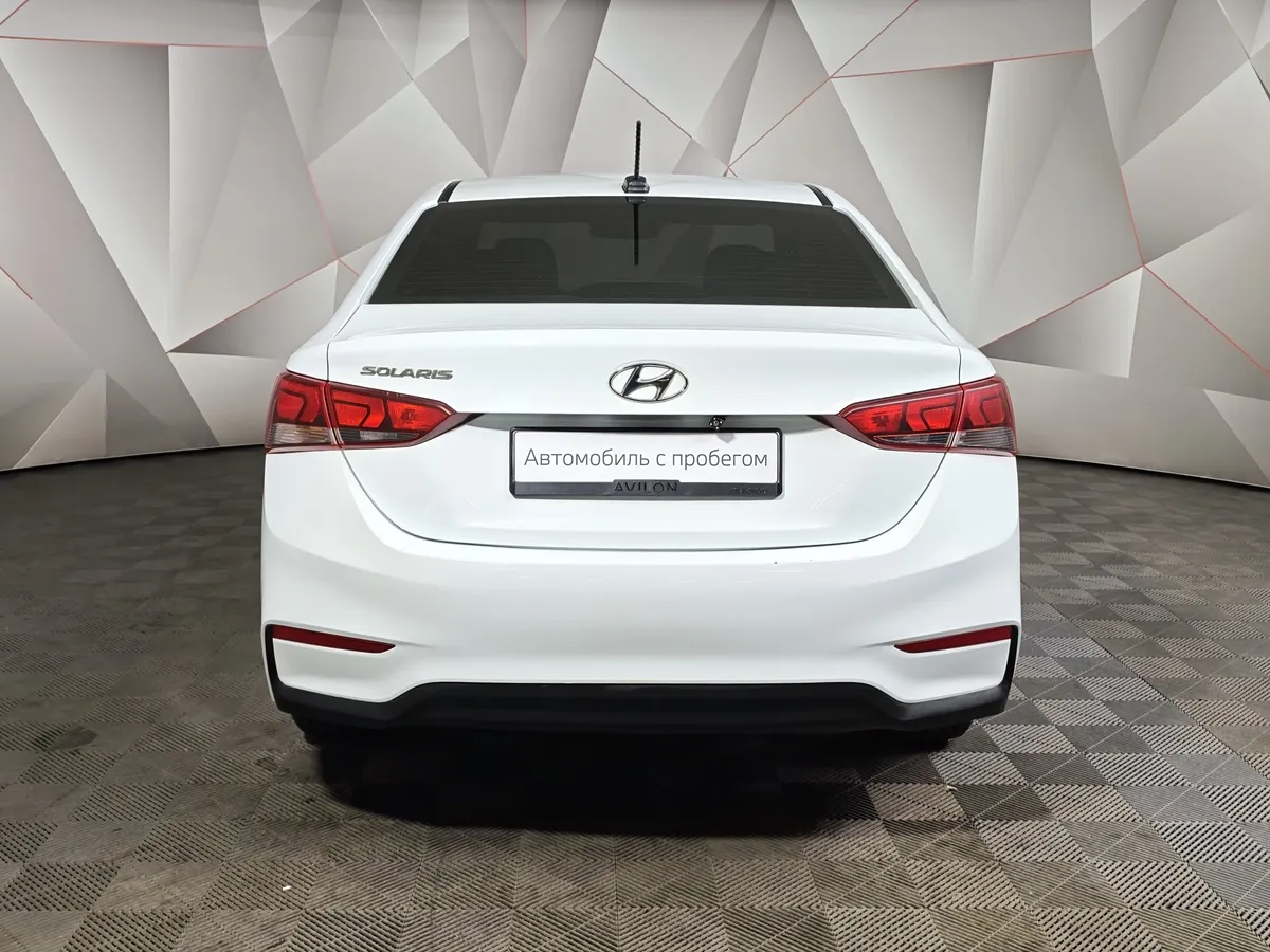 Hyundai Solaris 1.4 AT (107 л.с.) Active Белый в АВИЛОН. Слайд №8