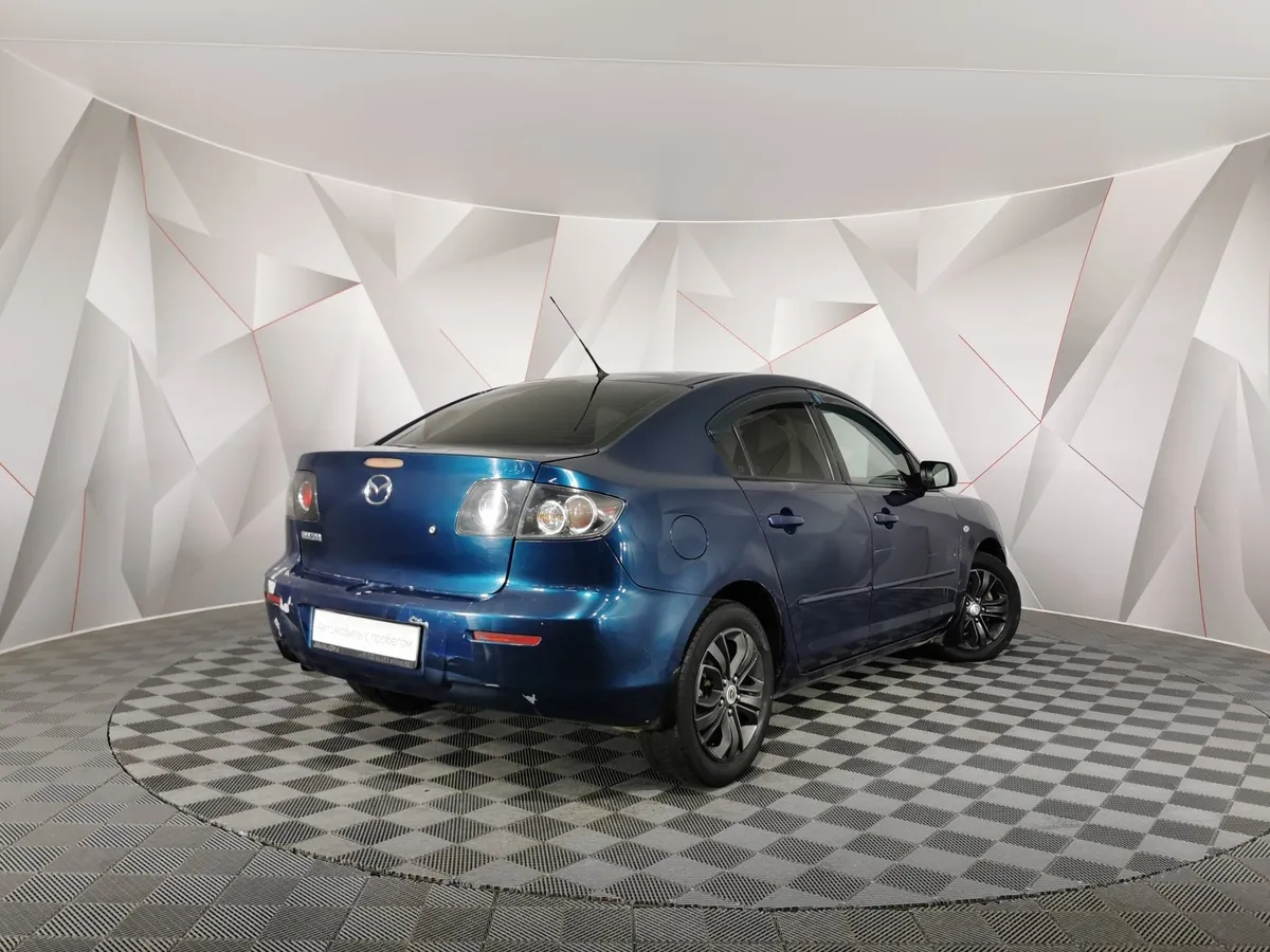 Mazda 3 1.6 AT (105 л.с.) Зеленый в АВИЛОН. Слайд №2