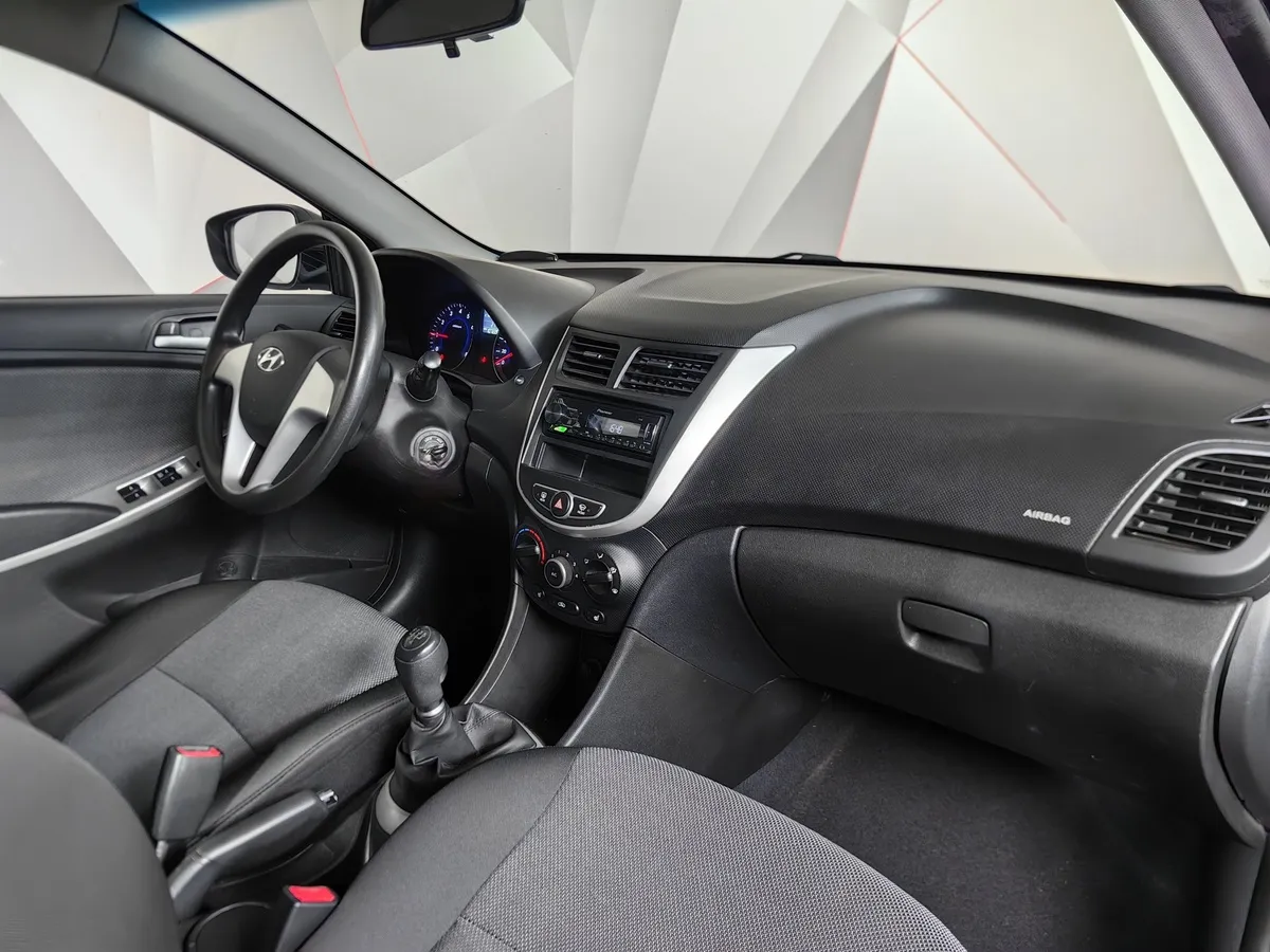 Hyundai Solaris 1.6 MT (123 л.с.) Optima Черный в АВИЛОН. Слайд №13
