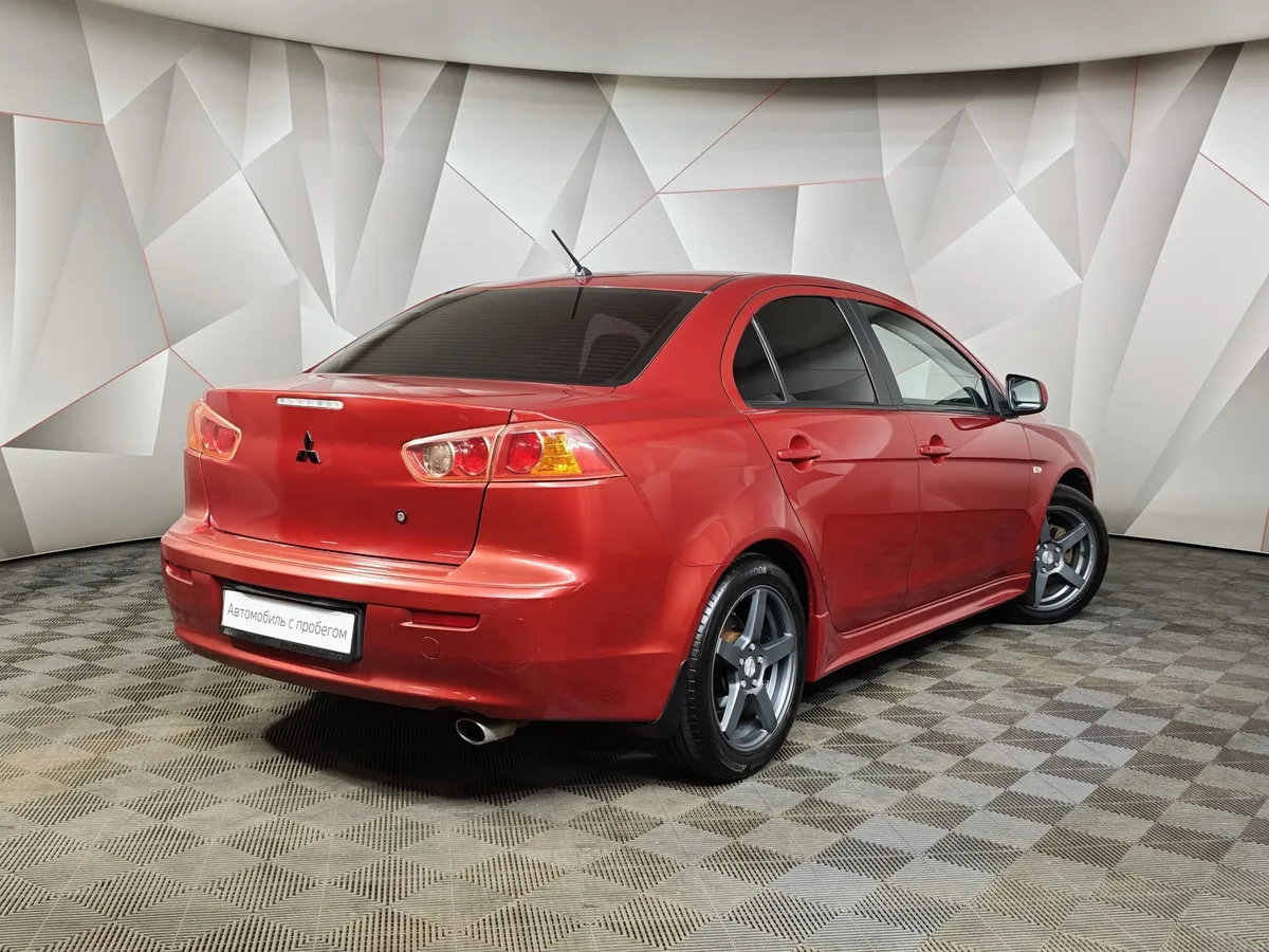 Mitsubishi Lancer 1.8 CVT (143 л.с.) Красный в АВИЛОН. Слайд №2