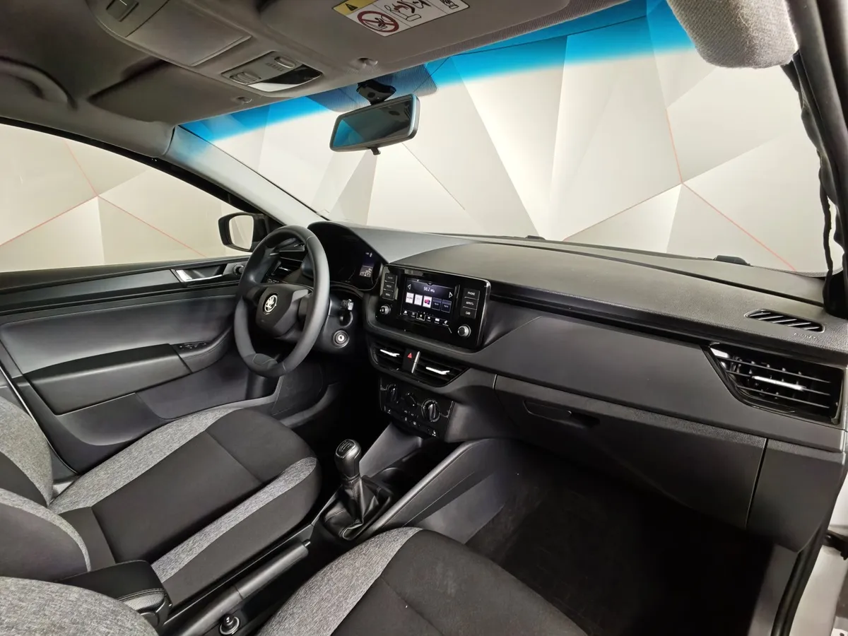 Skoda Rapid 1.6 MT (90 л.с.) Белый в АВИЛОН. Слайд №13