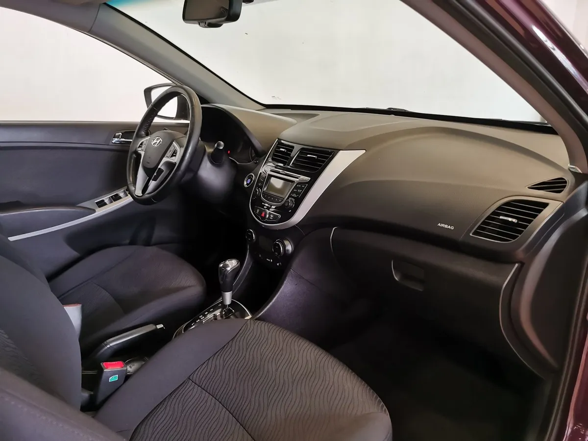 Hyundai Solaris 1.6 AT (123 л.с.) Elegance + Prestige + Safety Фиолетовый в АВИЛОН. Слайд №12