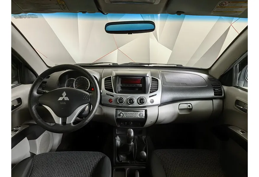 Mitsubishi L200 2.5 DI-D MT 4WD (136 л.с.) Серебристый в АВИЛОН. Слайд №11