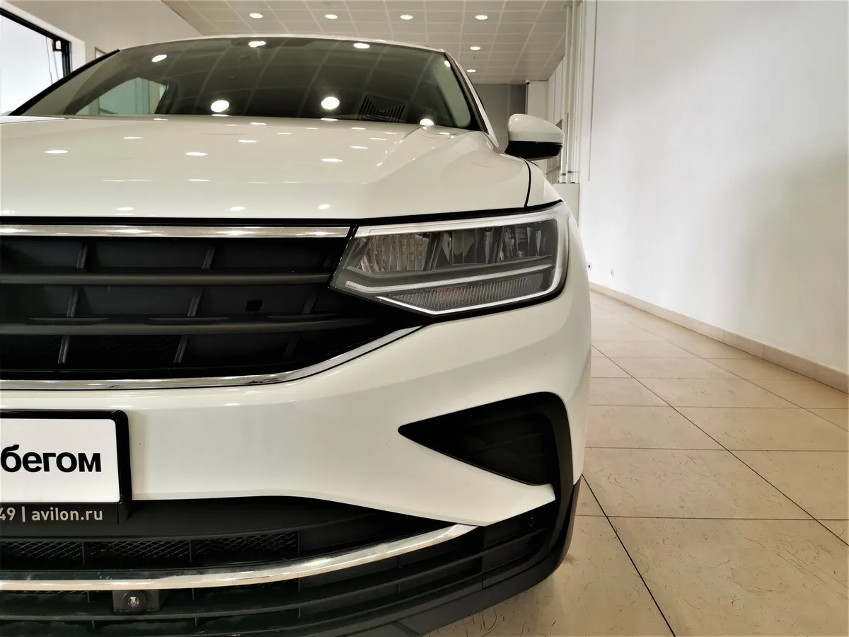Volkswagen Tiguan 1.4 TSI BlueMotion DSG (150 л.с.) Comfortline Белый в АВИЛОН. Слайд №10