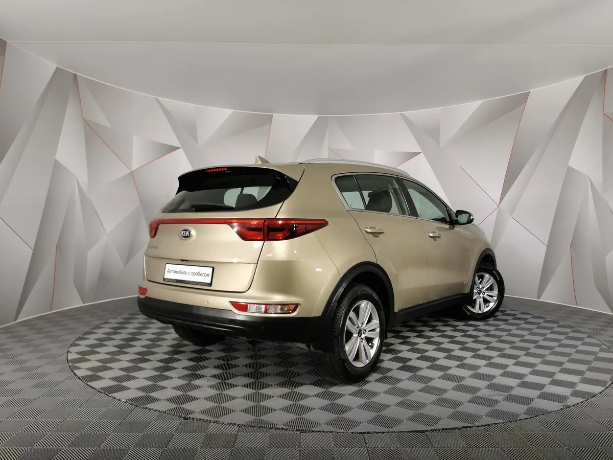 Kia Sportage 2.0 AT 4WD (150 л.с.) Luxe Коричневый в АВИЛОН. Слайд №2