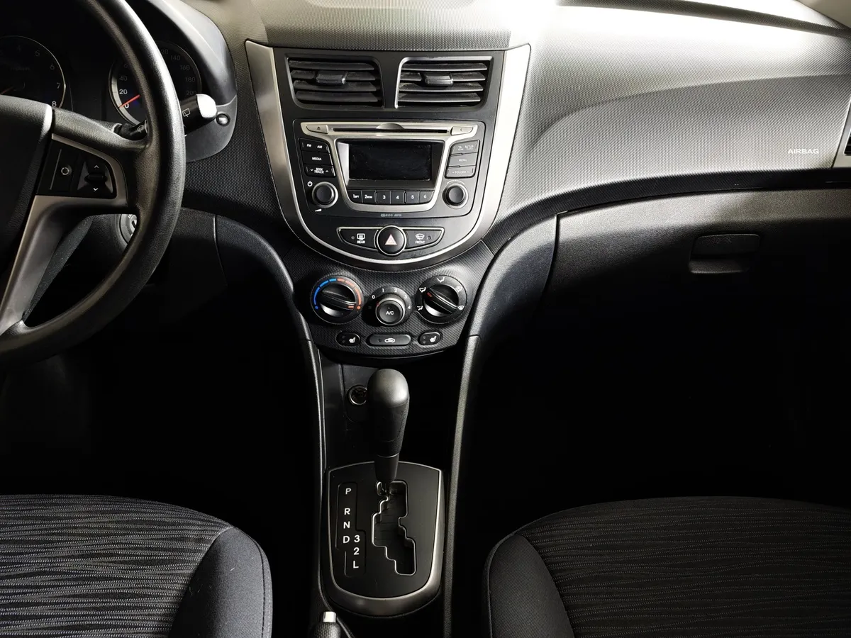 Hyundai Solaris 1.4 AT (107 л.с.) Classic Коричневый в АВИЛОН. Слайд №15