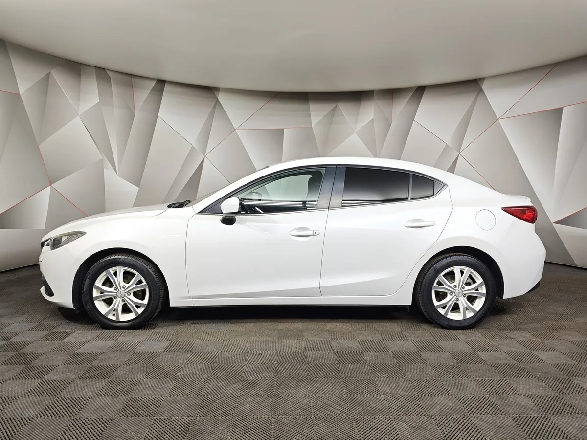 Mazda 3 1.6 MT (104 л.с.) Белый в АВИЛОН. Слайд №5
