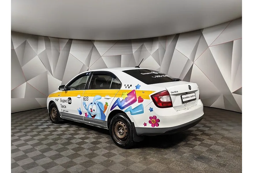 Skoda Rapid 1.6 AT (110 л.с.) Белый в АВИЛОН. Слайд №4