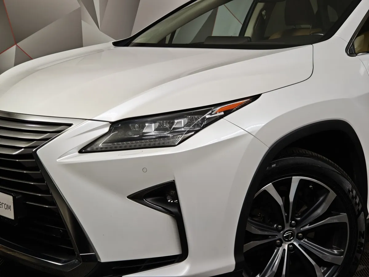 Lexus RX 2.0 AT AWD (238 л.с.) Executive Белый в АВИЛОН. Слайд №10