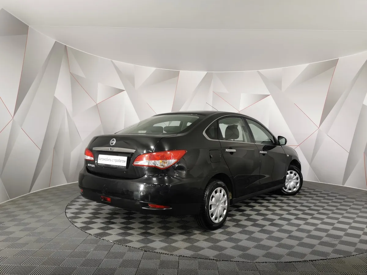 Nissan Almera 1.6 MT (102 л.с.) Черный в АВИЛОН. Слайд №2