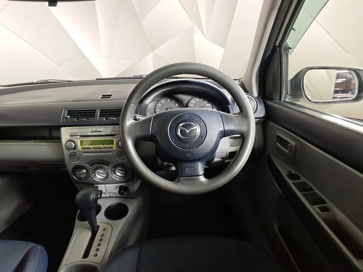 Mazda Demio 1.5 AT (100 л.с.) Белый в АВИЛОН. Слайд №18