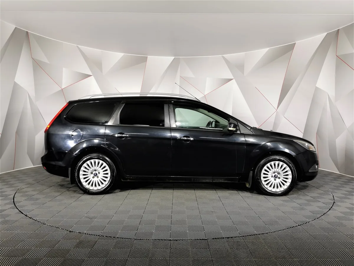Ford Focus 2.0 AT (145 л.с.) Ghia Черный в АВИЛОН. Слайд №6