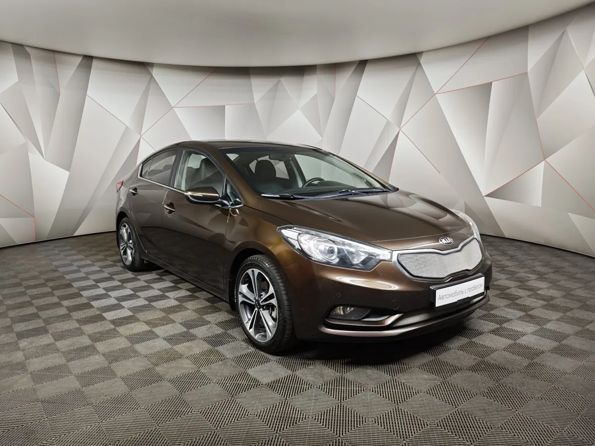 Kia Cerato 1.6 AT (130 л.с.) Коричневый в АВИЛОН. Слайд №3