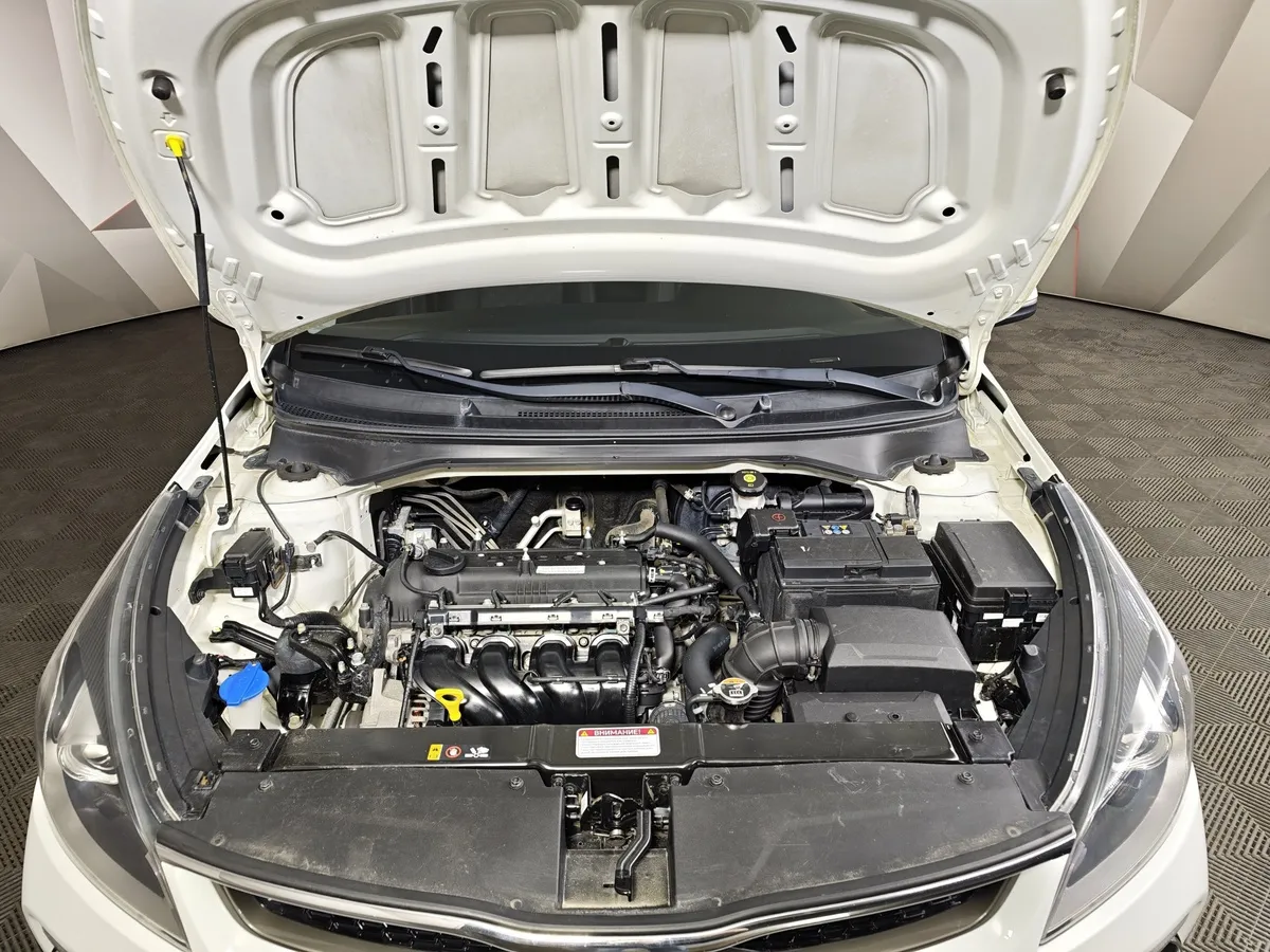 Kia Rio 1.6 AT (123 л.с.) Белый в АВИЛОН. Слайд №11