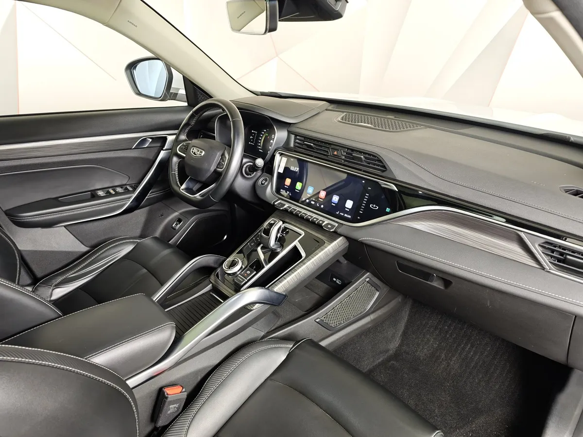 Geely Atlas Pro 1.5T 7DCT AWD (177 л.с.) Flagship Белый в АВИЛОН. Слайд №12