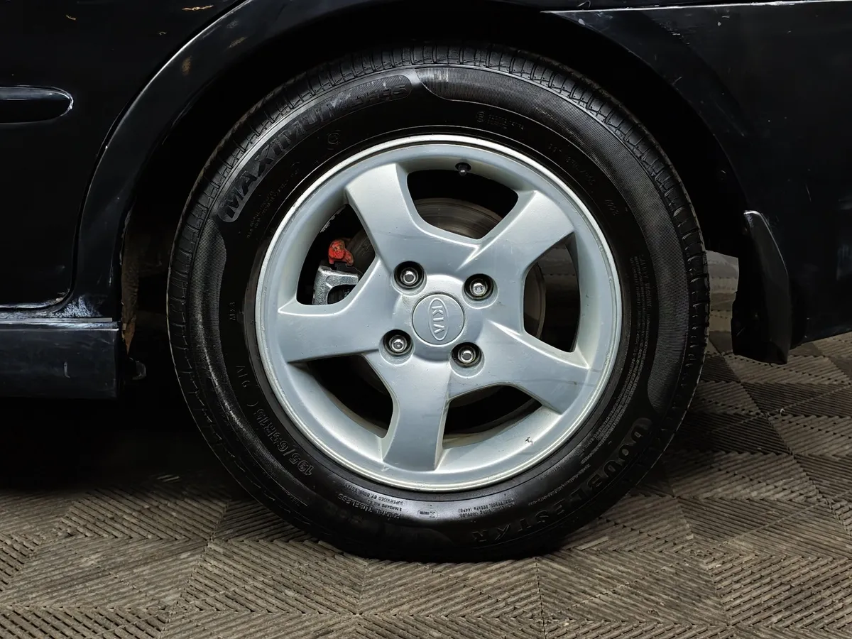 Kia Cerato 1.6 MT (105 л.с.) Черный в АВИЛОН. Слайд №9