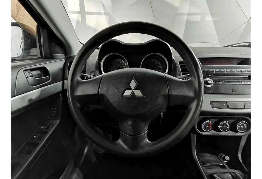 Mitsubishi Lancer 1.8 MT (143 л.с.) Серый в АВИЛОН. Слайд №19