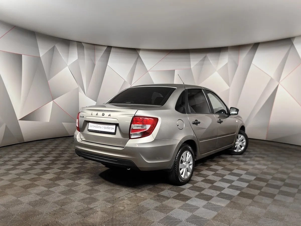 ВАЗ (Lada) Granta 1.6 MT 16кл (98 л.с.) Серый в АВИЛОН. Слайд №2