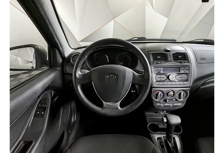ВАЗ (Lada) Granta 1.6 AT 16кл (98 л.с.) Коричневый в АВИЛОН. Слайд №15