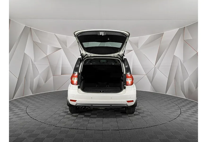 Skoda Yeti 1.8 TSI 4x4 DSG (152 л.с.) Белый в АВИЛОН. Слайд №12