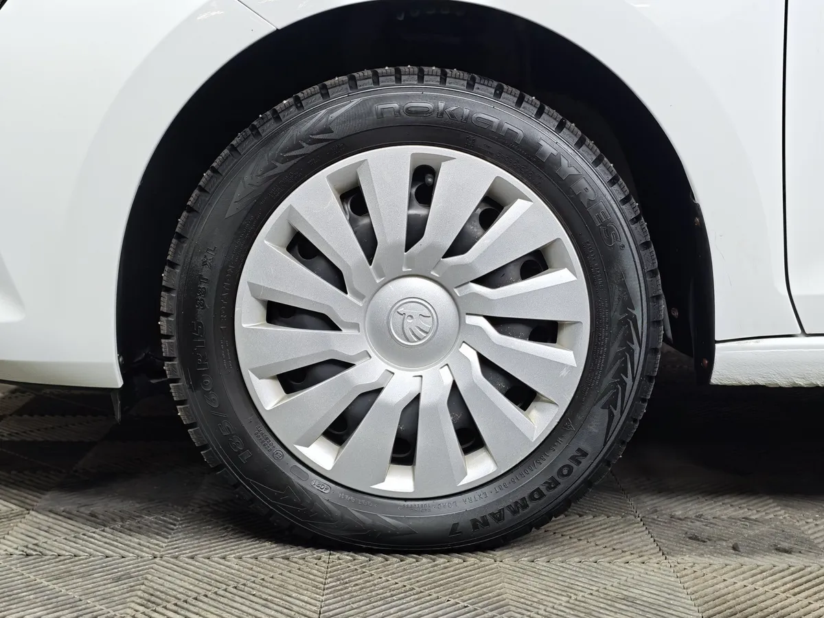 Skoda Rapid 1.6 AT (110 л.с.) Белый в АВИЛОН. Слайд №9