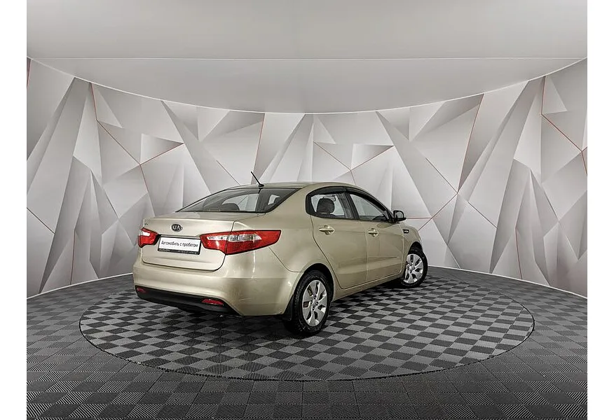 Kia Rio 1.6 AT (123 л.с.) Бежевый в АВИЛОН. Слайд №2