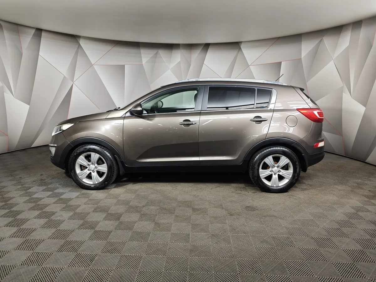 Kia Sportage 2.0 AT 4WD (150 л.с.) Luxe Коричневый в АВИЛОН. Слайд №5