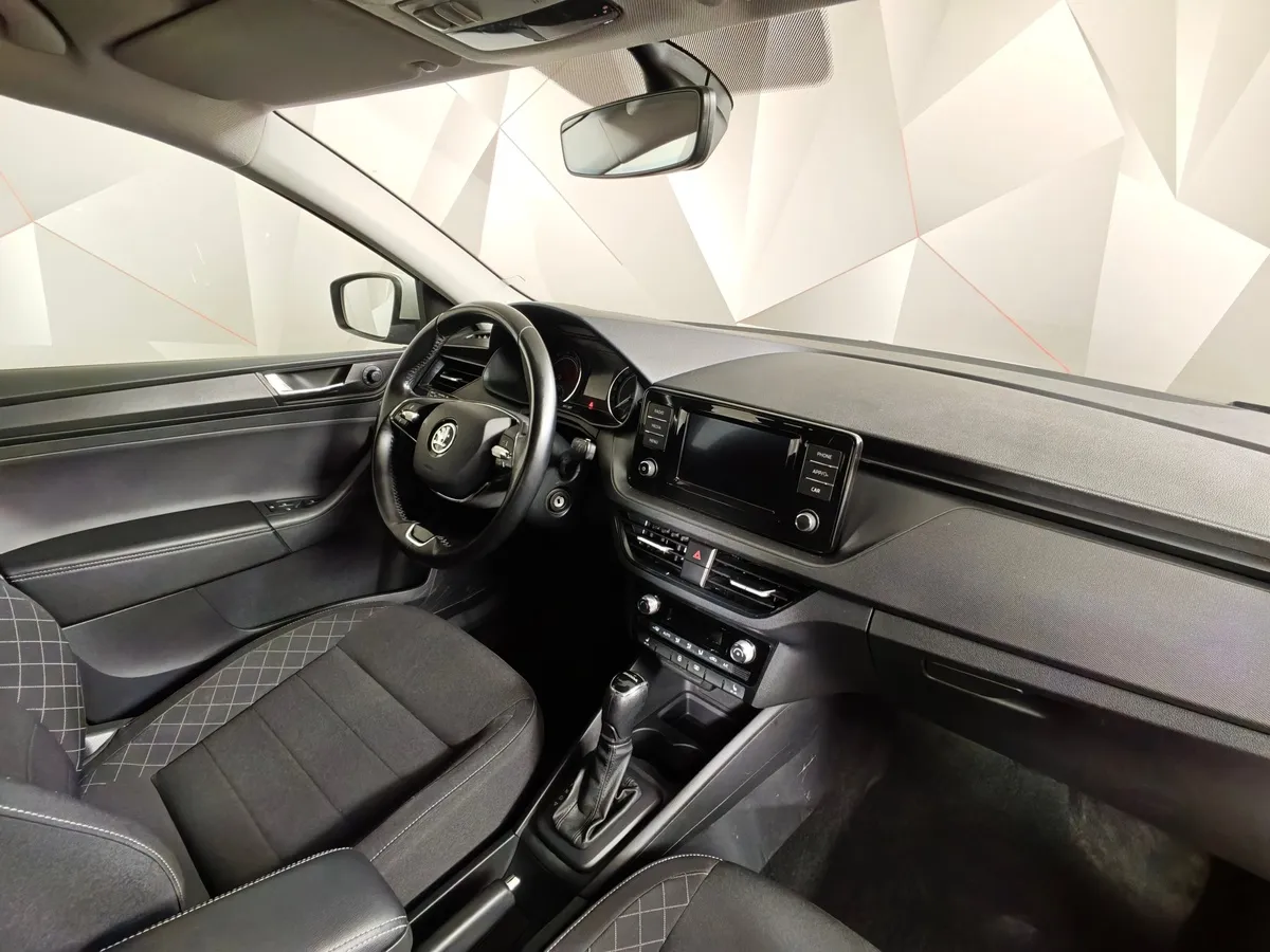 Skoda Rapid 1.6 AT (110 л.с.) Белый в АВИЛОН. Слайд №13