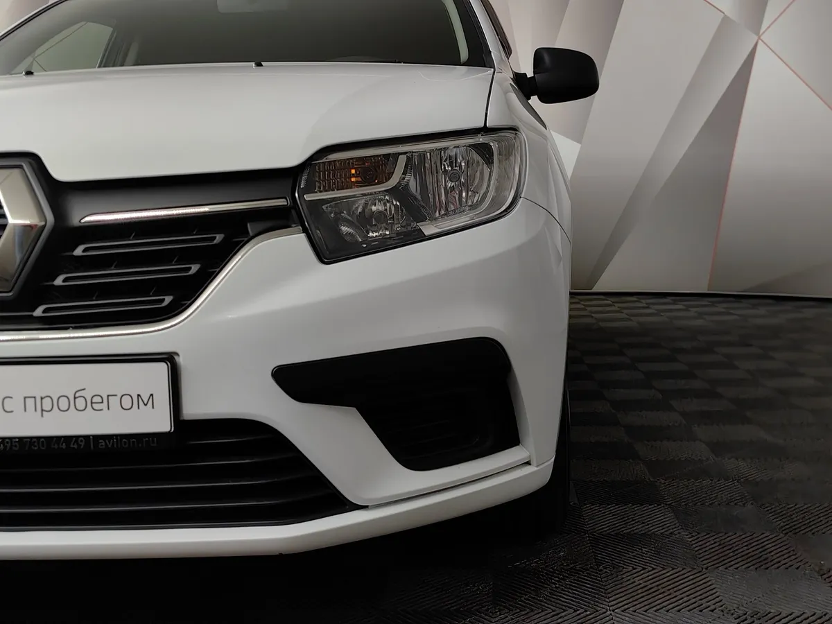 Renault Sandero 1.6 MT (82 л.с.) Confort Белый в АВИЛОН. Слайд №10