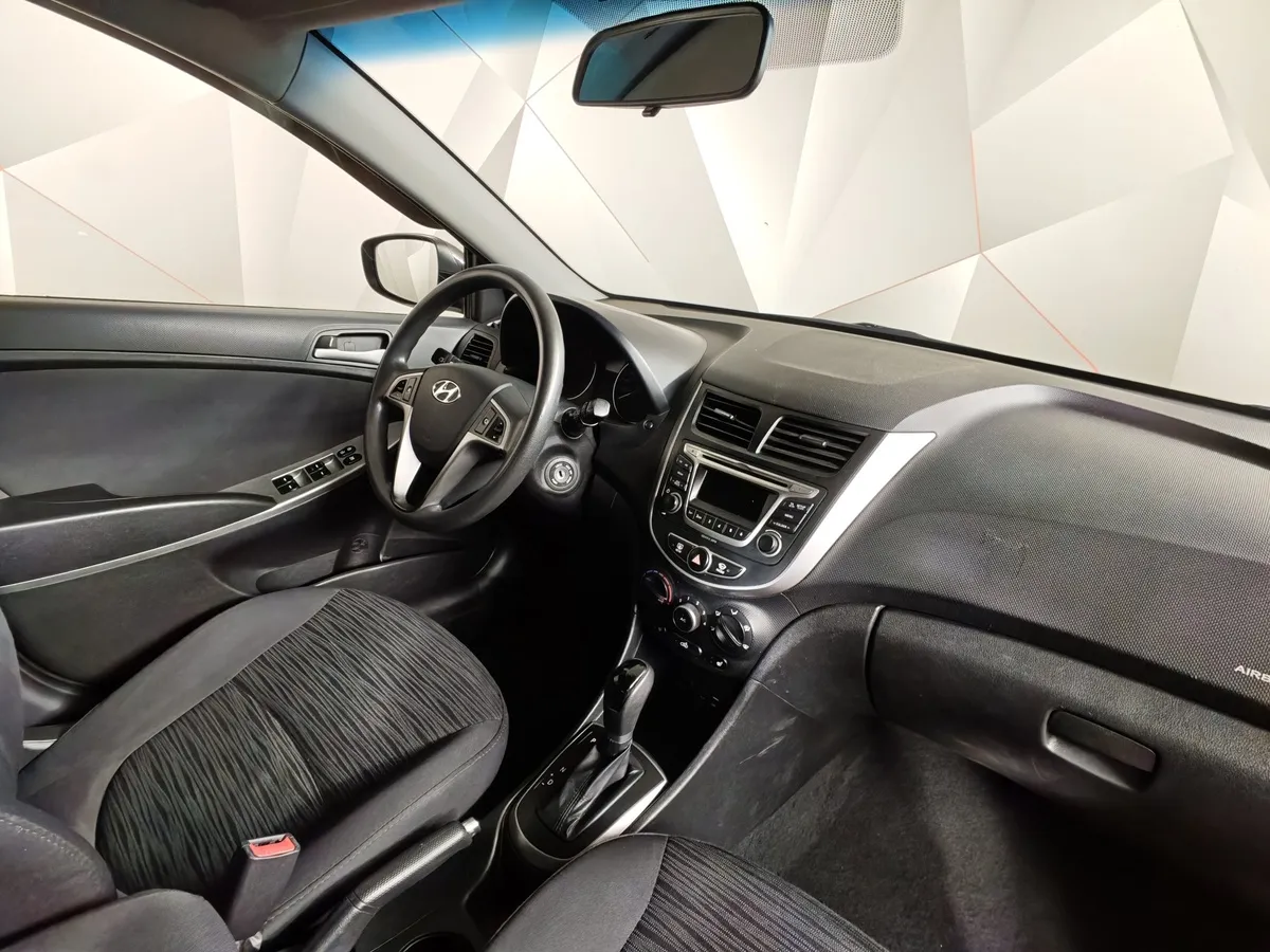 Hyundai Solaris 1.6 AT (123 л.с.) Classic + AC Коричневый в АВИЛОН. Слайд №13