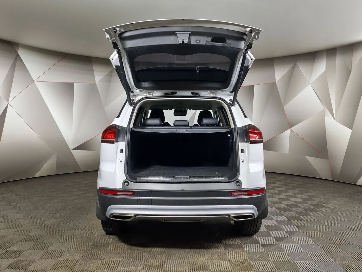 Geely Atlas Pro 1.5T 7DCT AWD (177 л.с.) Flagship Белый в АВИЛОН. Слайд №12