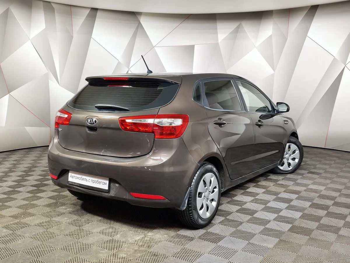 Kia Rio 1.6 AT (123 л.с.) Коричневый в АВИЛОН. Слайд №2