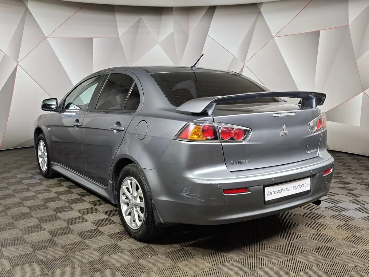 Mitsubishi Lancer 1.6 AT (117 л.с.) Серый в АВИЛОН. Слайд №4