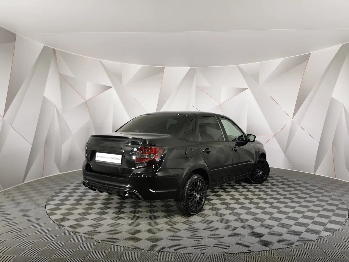 ВАЗ (Lada) Granta 1.6 MT 8кл (87 л.с.) Черный в АВИЛОН. Слайд №2