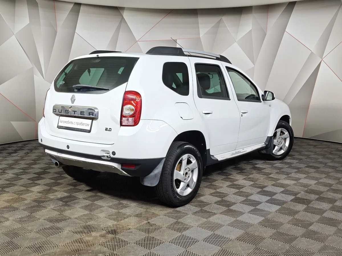 Renault Duster 2.0 AT (135 л.с.) Белый в АВИЛОН. Слайд №2