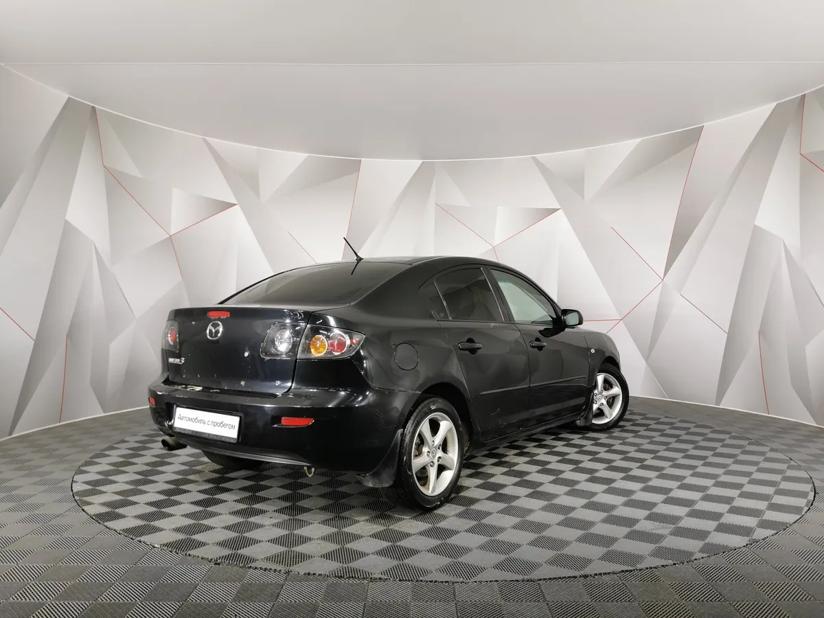 Mazda 3 1.6 MT (105 л.с.) Черный в АВИЛОН. Слайд №2