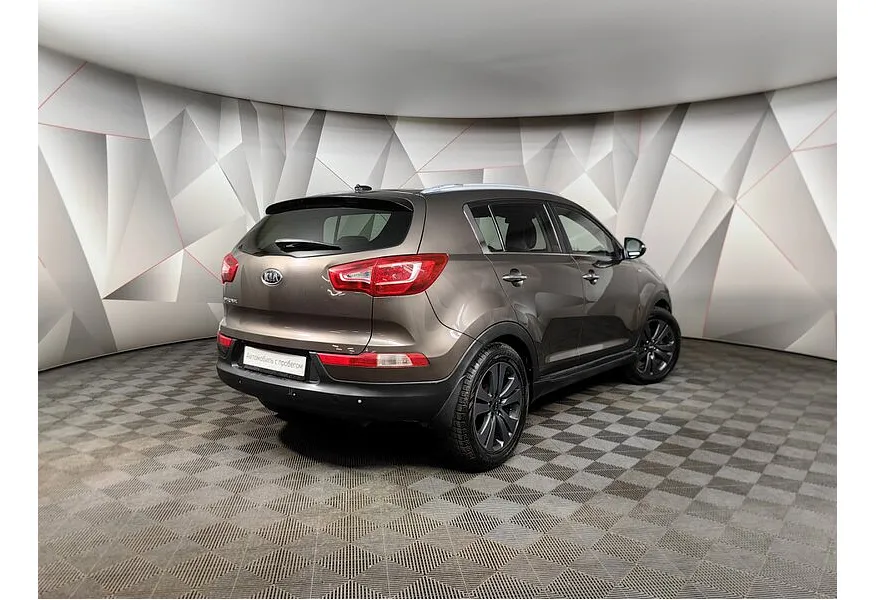 Kia Sportage 2.0 AT 4WD (150 л.с.) Luxe Коричневый в АВИЛОН. Слайд №2