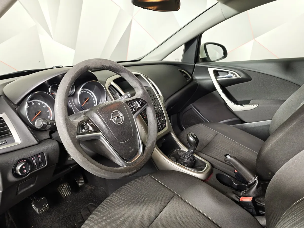 Opel Astra 1.6 MT (115 л.с.) Белый в АВИЛОН. Слайд №19