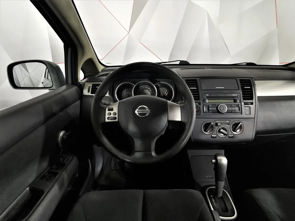 Nissan Tiida 1.6 AT (110 л.с.) Серый в АВИЛОН. Слайд №19