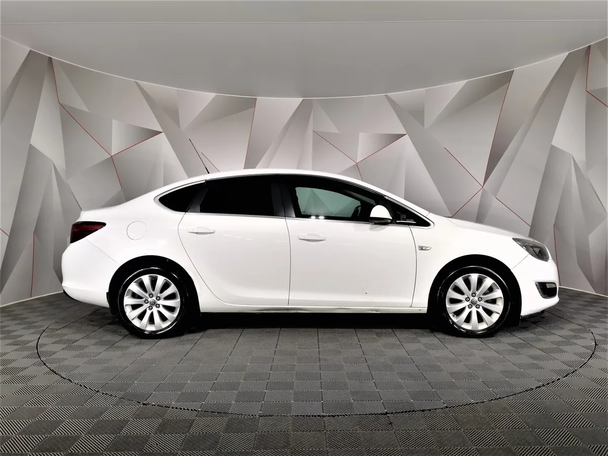 Opel Astra 1.6 AT (115 л.с.) Белый в АВИЛОН. Слайд №6