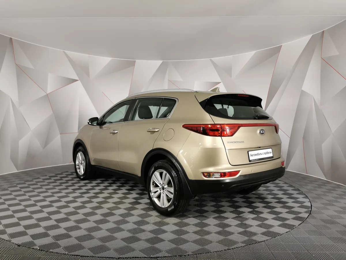 Kia Sportage 2.0 AT 4WD (150 л.с.) Luxe Коричневый в АВИЛОН. Слайд №4