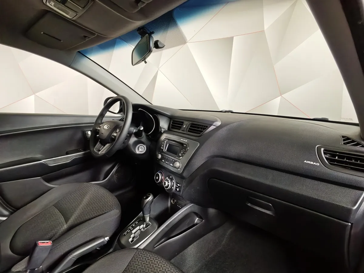 Kia Rio 1.4 AT (107 л.с.) Голубой в АВИЛОН. Слайд №12