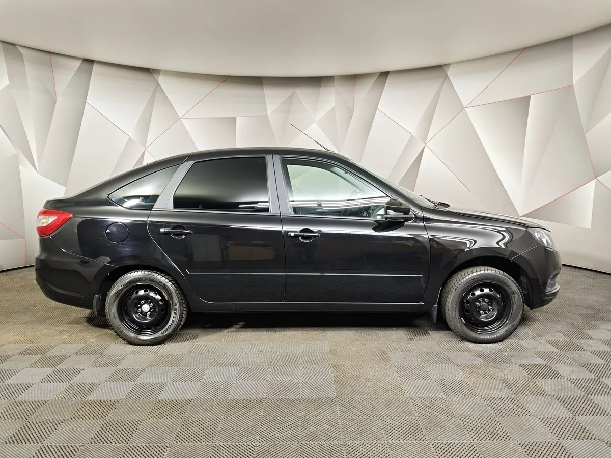 ВАЗ (Lada) Granta 1.6 MT 16кл (106 л.с.) Черный в АВИЛОН. Слайд №6