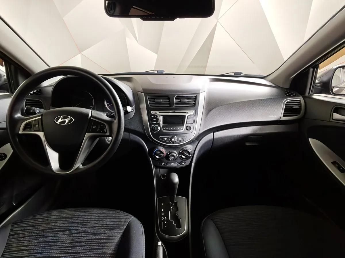 Hyundai Solaris 1.4 AT (107 л.с.) Classic Коричневый в АВИЛОН. Слайд №14