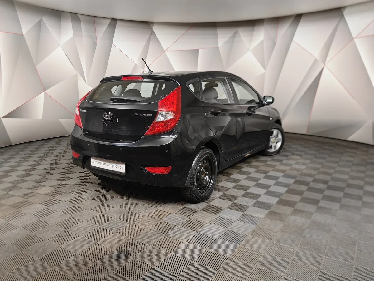 Hyundai Solaris 1.4 MT (107 л.с.) Active Черный в АВИЛОН. Слайд №2